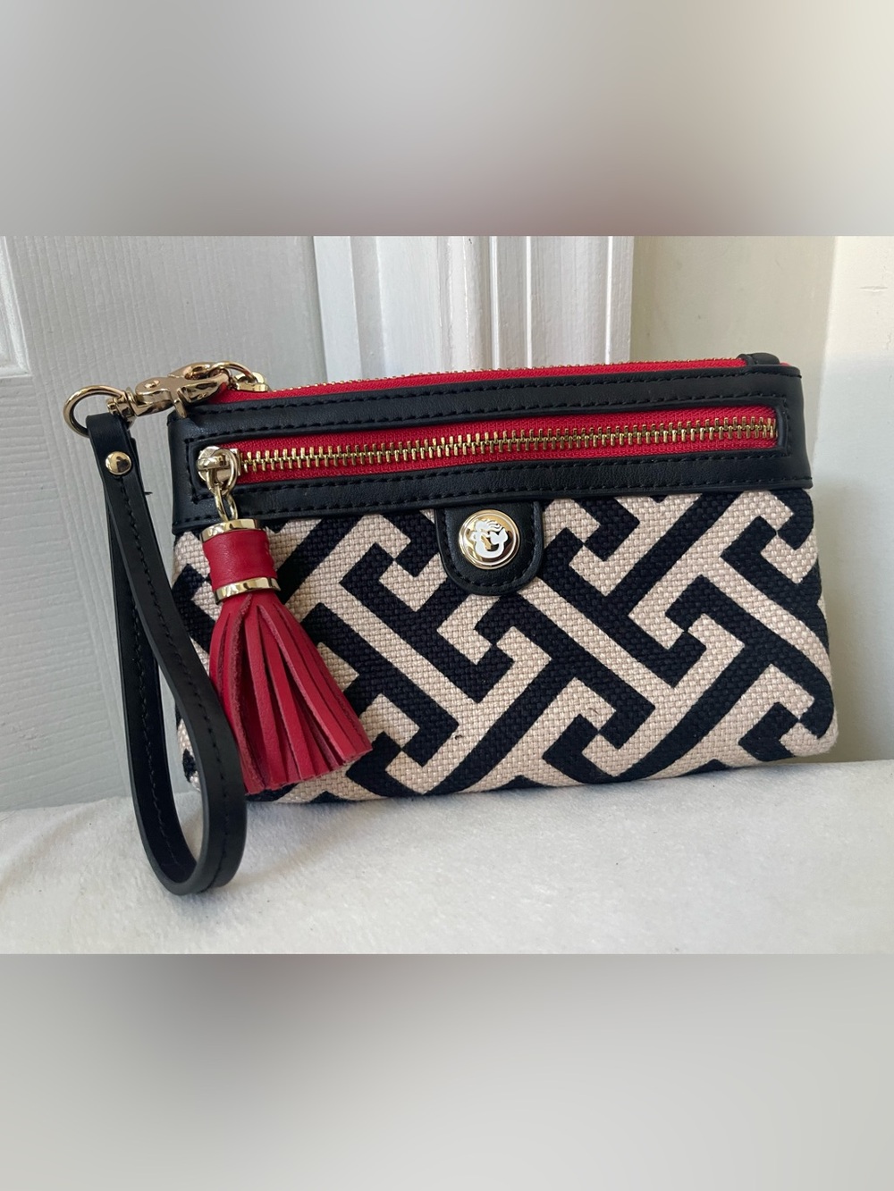 Stylish Black & Cream Geometric Wristlet with Red Accents